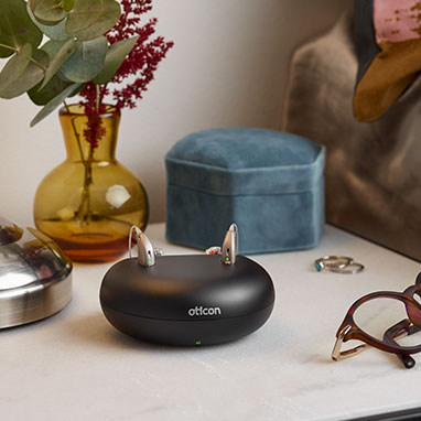 rechargeable hearing aid solution on night stand